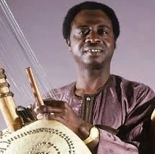 Dembo Konteh holding a kora